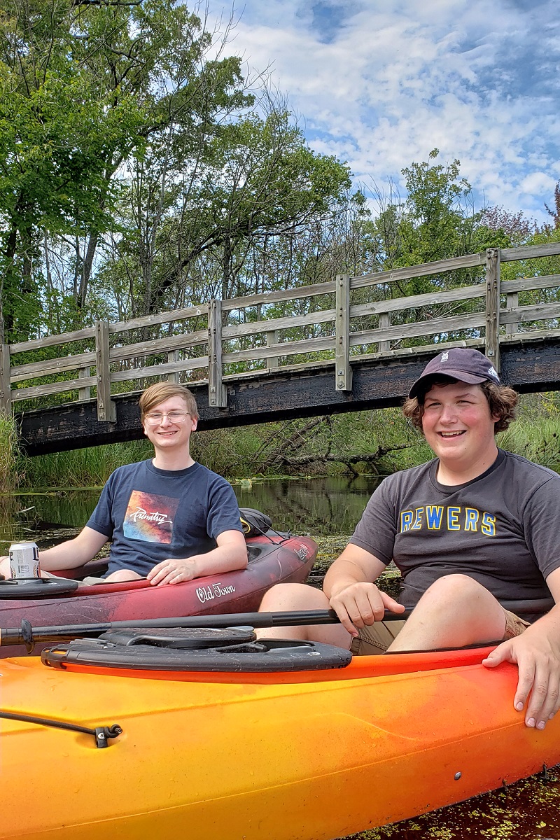 My cousin and I on a lake.